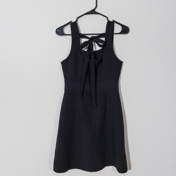 Chic Black Sleeveless Fit & Flare Dress with Bow-Tie Back – Elegant Minimalism - Picture 1 of 2